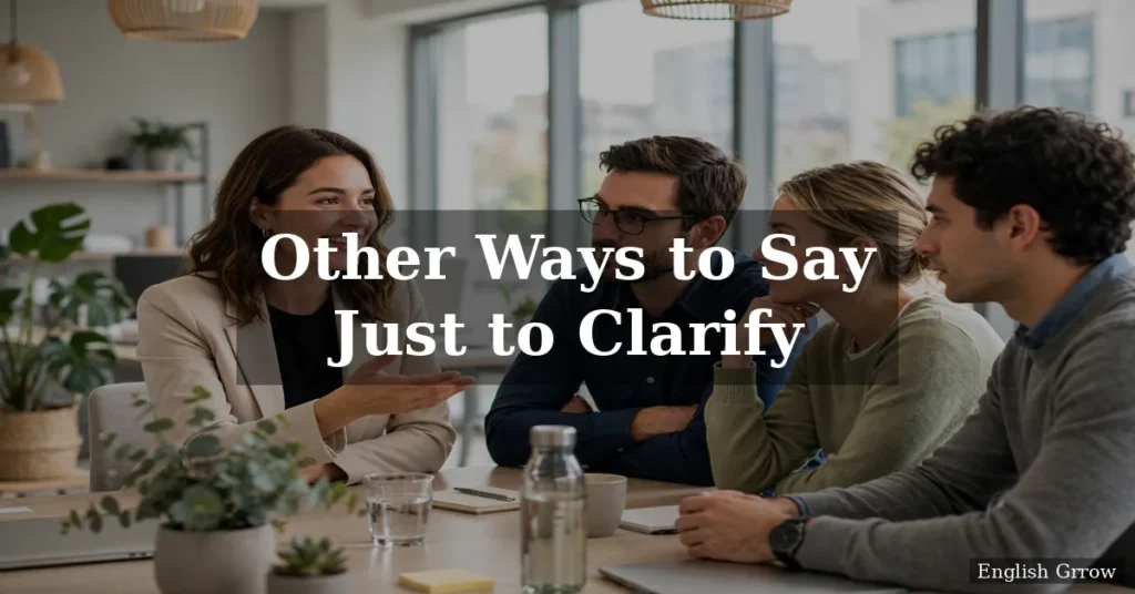 Other ways to say just to clarify, colleagues discussing a point clearly in a bright modern office